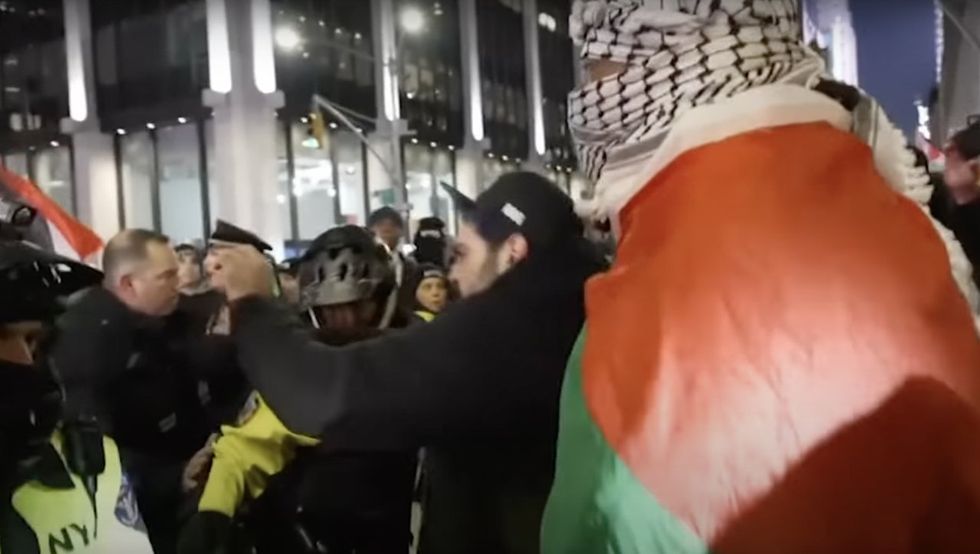 Pro-Palestinian mob gets violent at NYC Christmas tree lighting; one cop says‚ 'I was shoved‚ punched‚ kicked. It’s bulls**t'