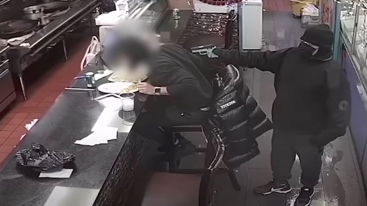 Shocking security video shows robber shoot restaurant customer point blank in the face during robbery in NYC