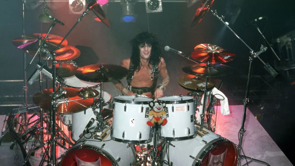 Rock drummer Tommy Lee accused of sexually assaulting woman on helicopter in 2003 after snorting cocaine, smoking marijuana