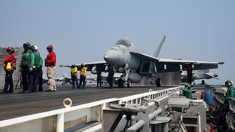 US forces fend off 10-hour attack of drones and missiles from Iran-backed rebels in the Red Sea