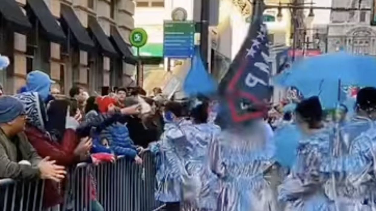 Leftist grabs Trump flag after Philly Mummers parade-goer waves it in his face, setting off New Year's Day dust-up