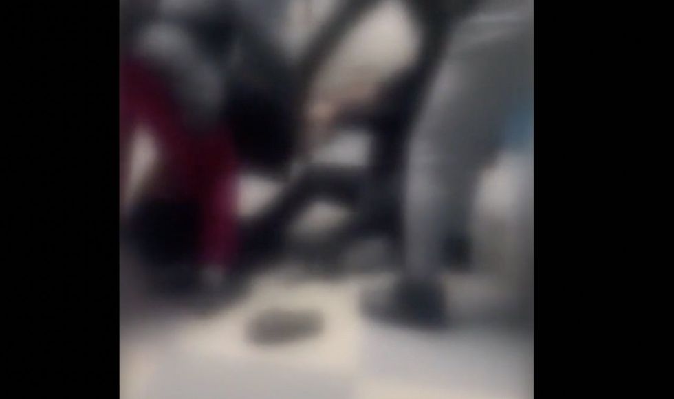 Parents of fighting students actually enter Philly HS and get physically involved in the fracas‚ forcing hour-long lockdown
