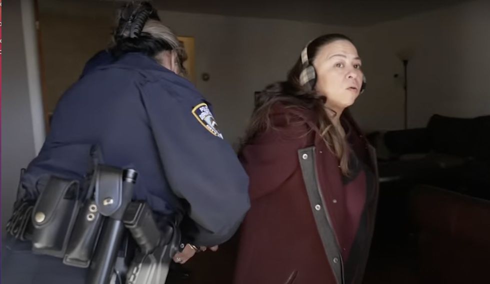 Video&colon; Cops actually arrest owner of $1 million home for changing locks on squatter‚ charge her with unlawful eviction