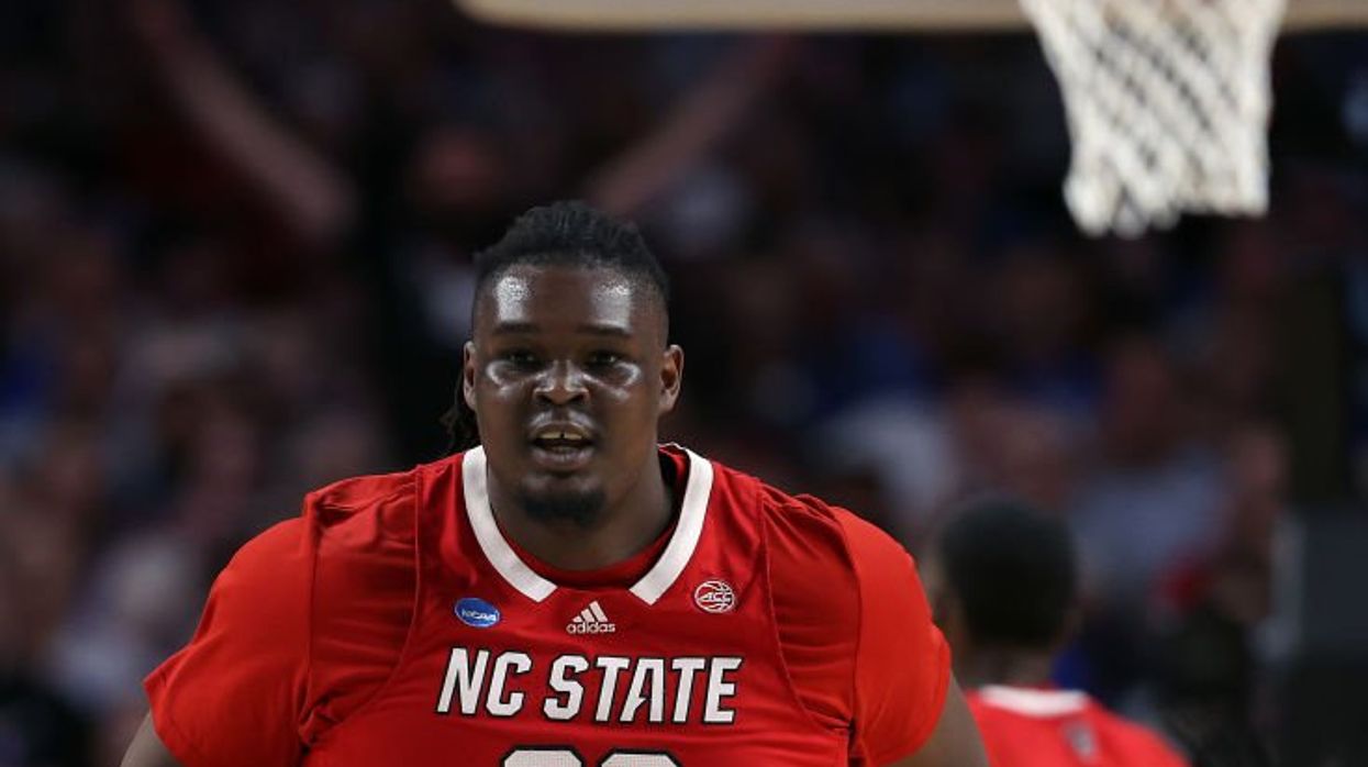 'Glory be to God': DJ Burns Jr. responds to haters after stunning win sends NC State to first Final Four since 1983