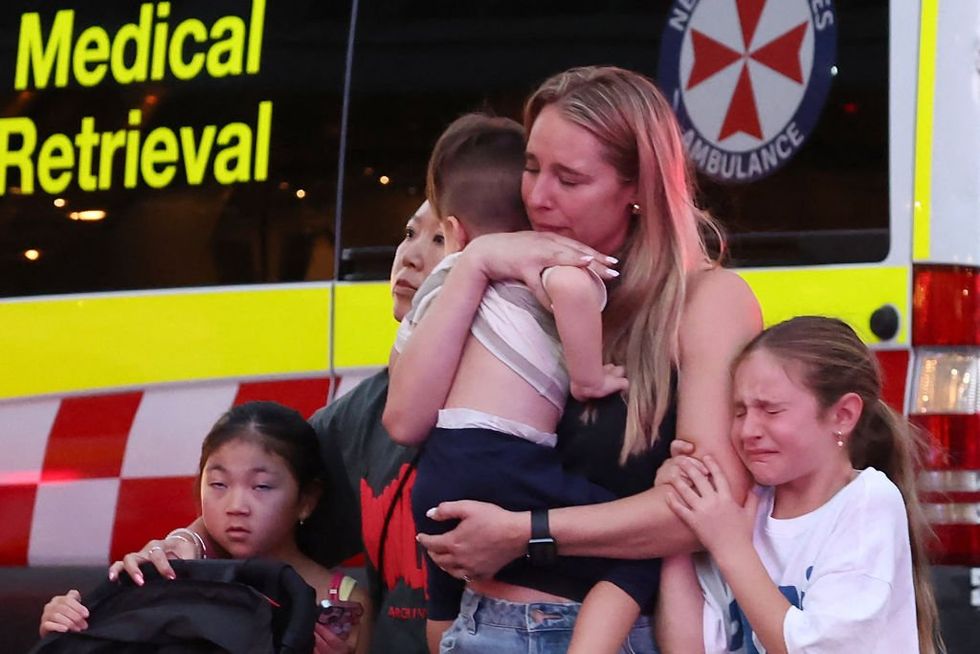 Video: Hero female cop fatally guns down knifeman who stabbed 6 bystanders to death at busy shopping center in Australia