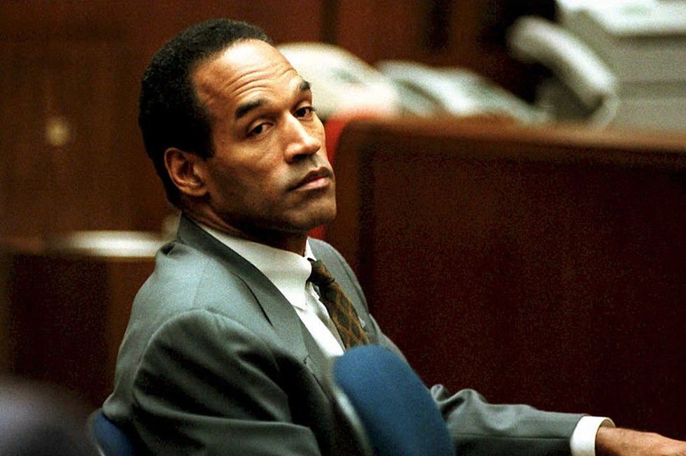 OJ Simpson&apos;s friend said the former NFLer couldn&apos;t let his ex-wife go‚ kept photos of her displayed in home