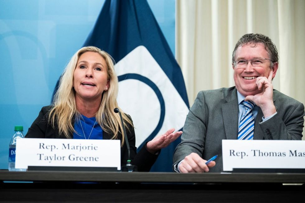Threat to Johnson&apos;s speakership looms larger as Massie cosponsors Greene&apos;s motion to vacate