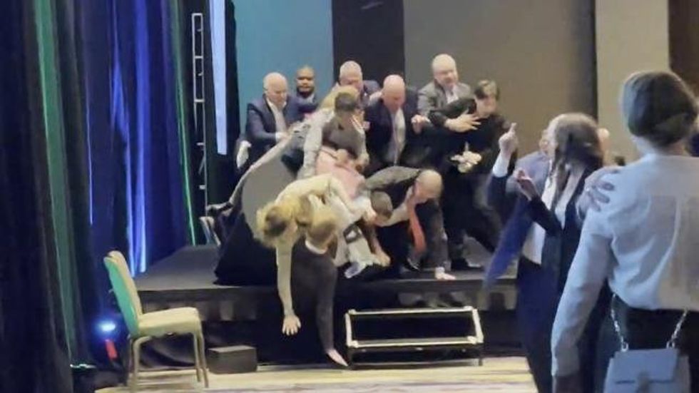 Watch: Physical confrontation ensues after climate change protesters storm stage at gala honoring Sen. Lisa Murkowski