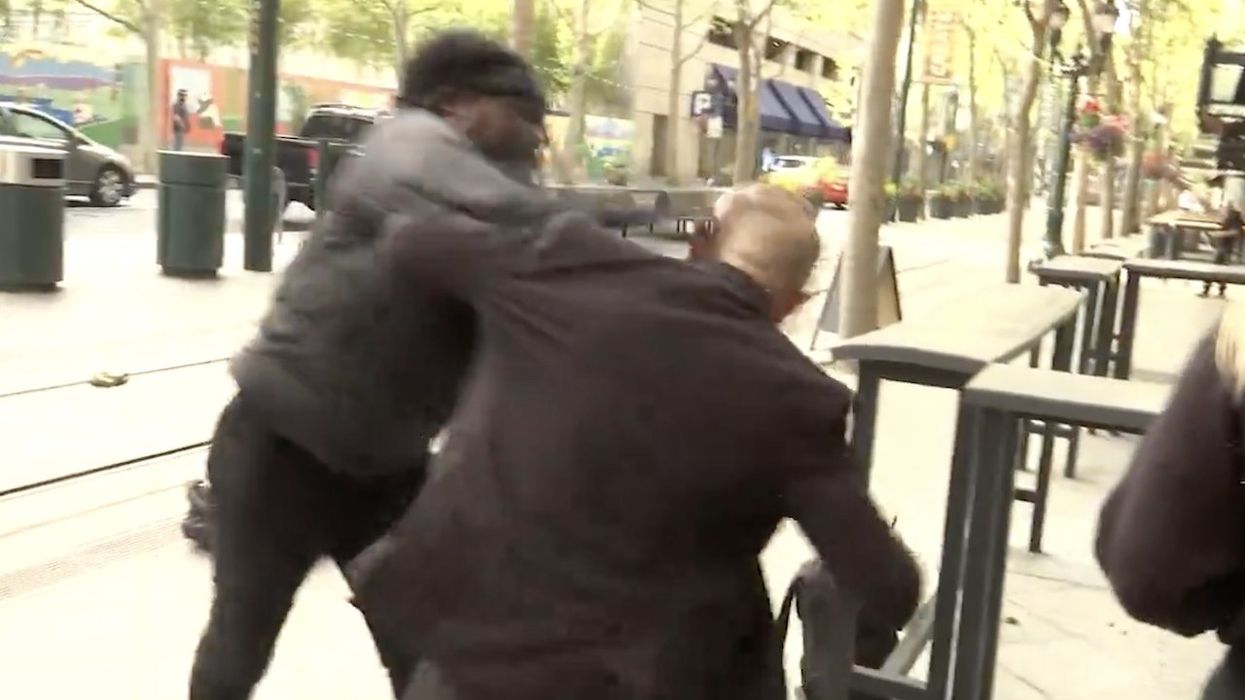 Video: Thug punches San Jose mayor's security officer while local TV station interviews Democratic mayor — and it's on