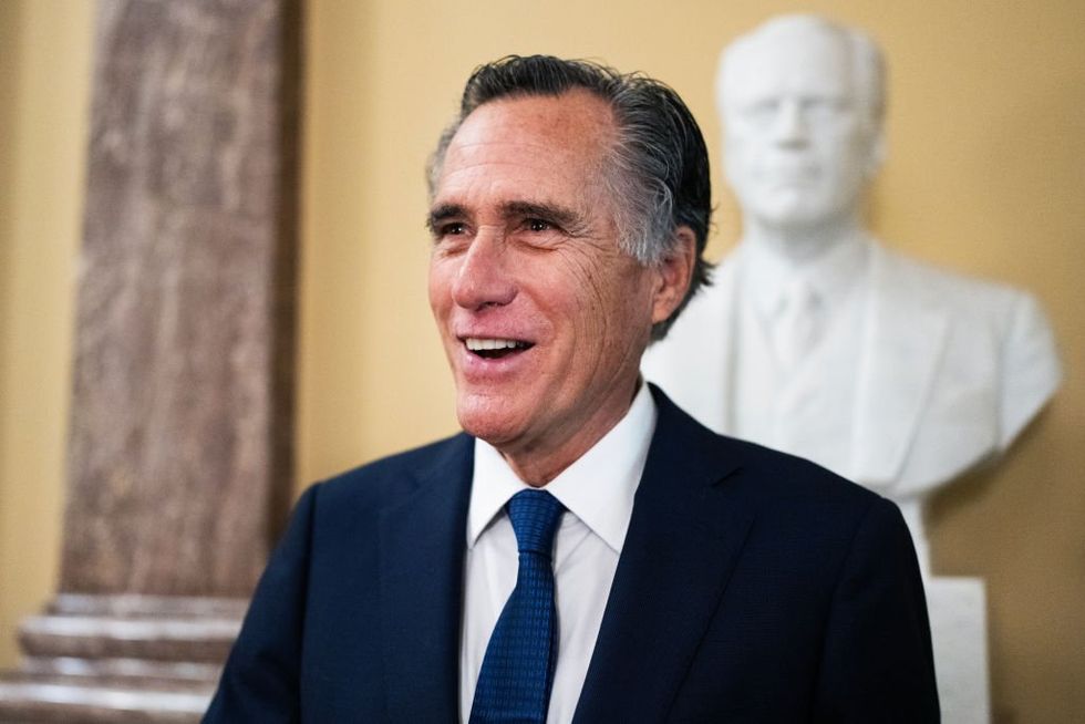 Romney says he laughs at the term 'America first'