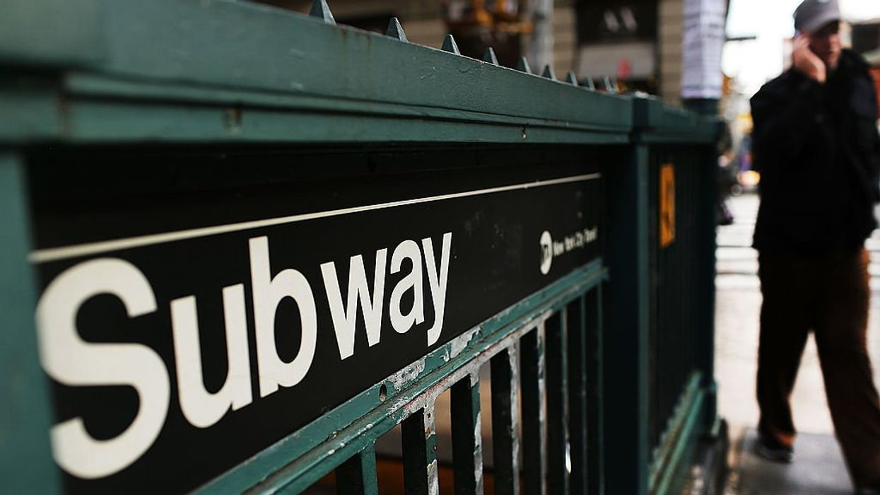 NYC subway rider set on fire after a man poured flaming liquid on him