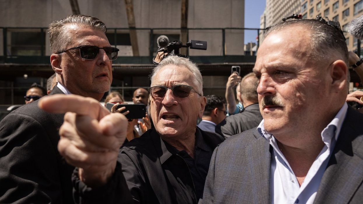 Robert De Niro's onscreen tough-guy persona appears to emerge amid verbal fisticuffs with Trump supporters in NYC