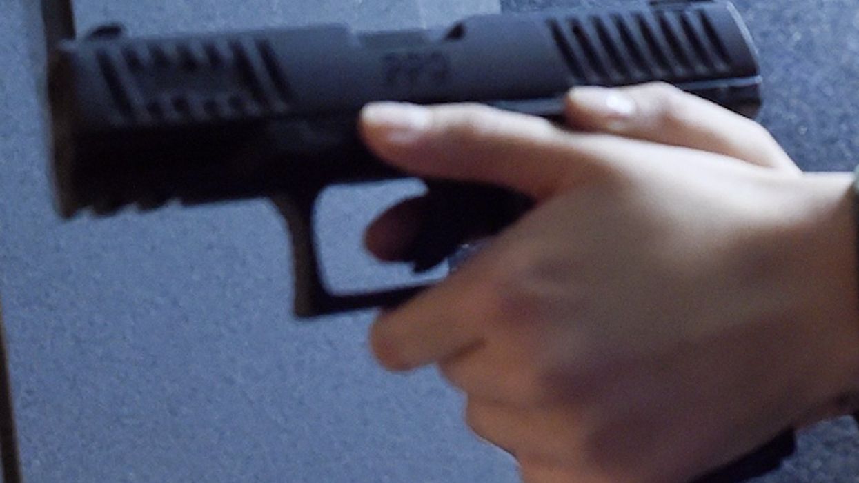 Armed crooks demand property from 53-year-old woman sitting in car. But she has a gun too — and opens fire.