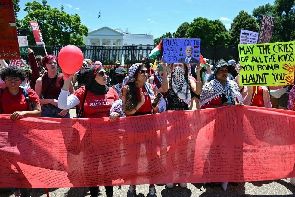 Huge pro-Palestine protest surrounds White House, smoke bombs set off, progressives demand 'butcher' Biden be arrested for war crimes