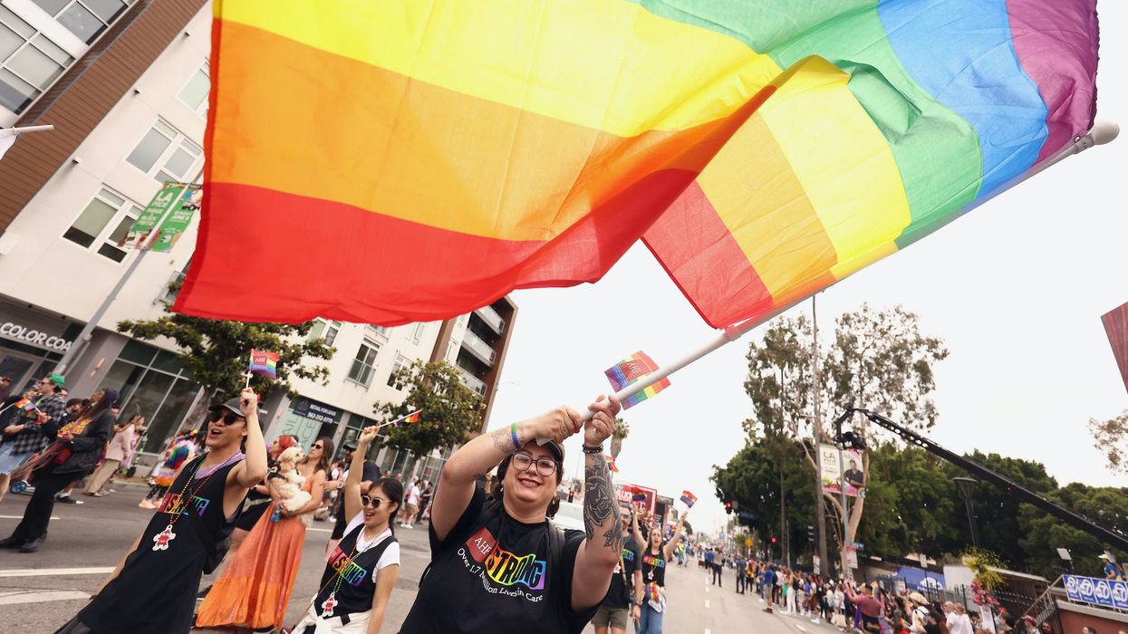 Los Angeles officials celebrate removal of 'No U-turn' signs they call 'remnants' of neighborhood's homophobia from the 90s