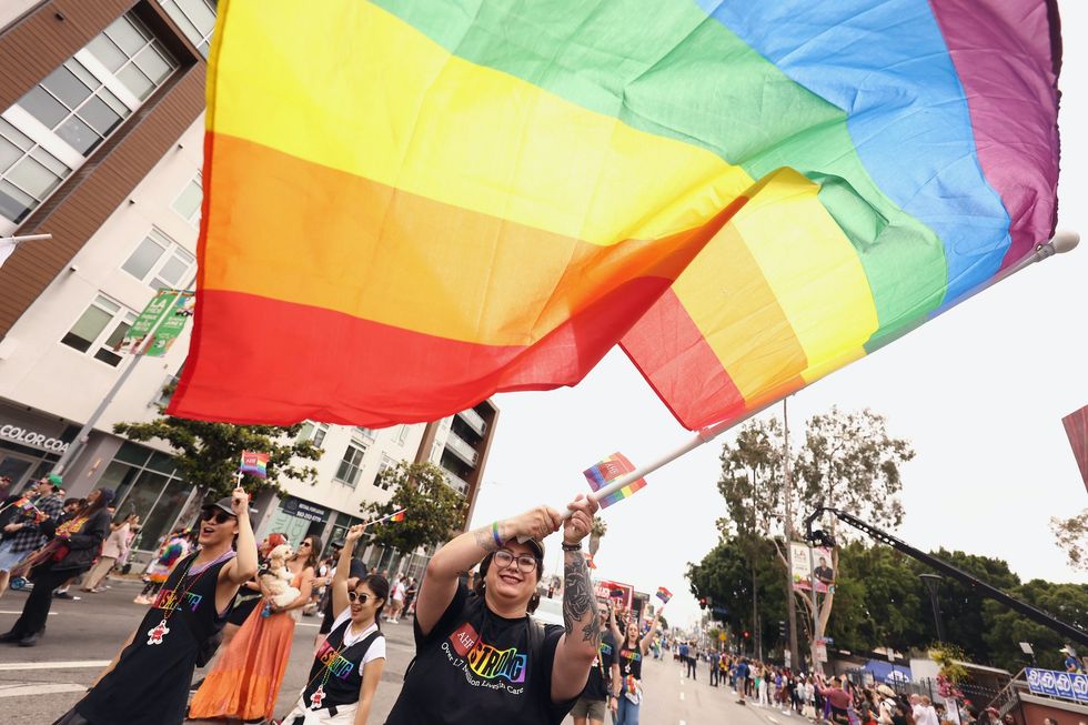 Los Angeles officials celebrate removal of 'No U-turn' signs they call 'remnants' of neighborhood's homophobia from the 90s