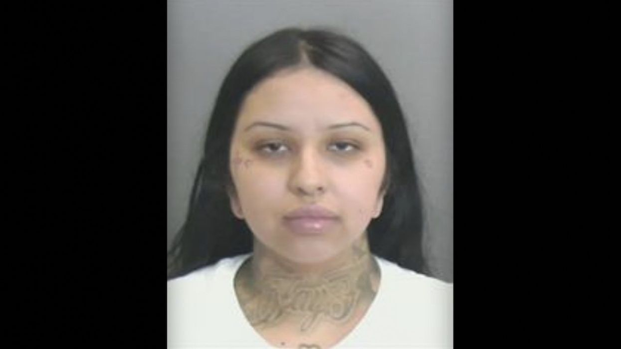 Female booked for murder after cops respond to gang-related shooting; male pronounced dead at hospital
