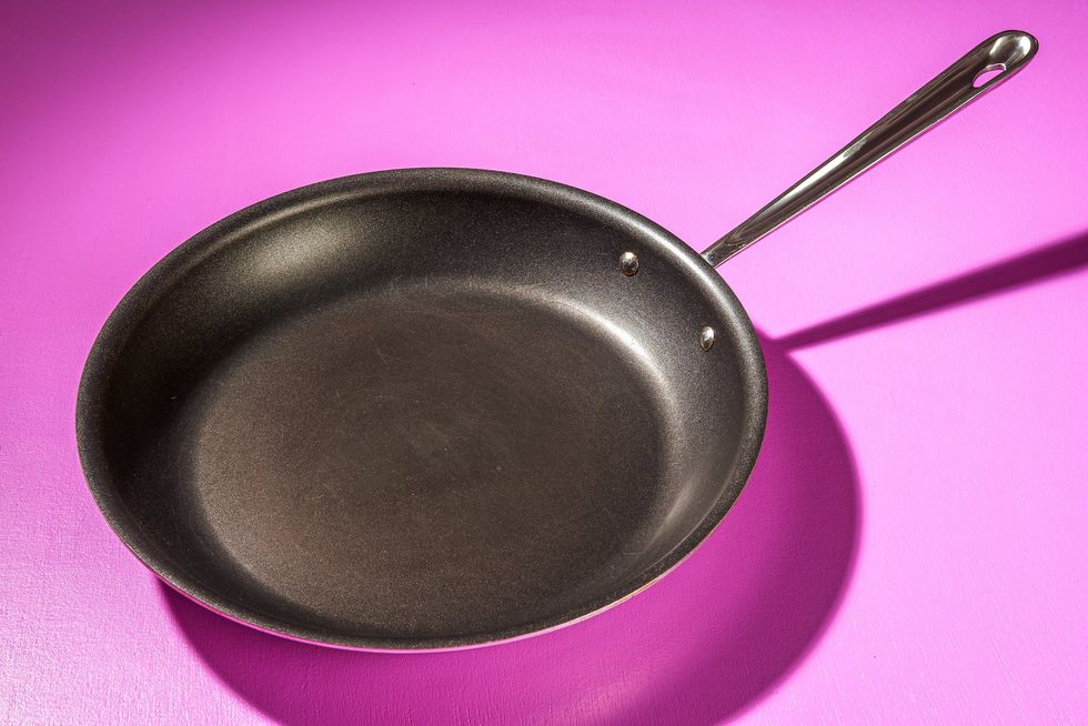 Chicago man beats down home intruder with a large frying pan, and it's all caught on security video: 'Almost killed him!'