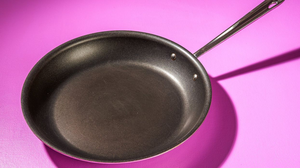 Chicago man beats down home intruder with a large frying pan, and it's all caught on security video: 'Almost killed him!'