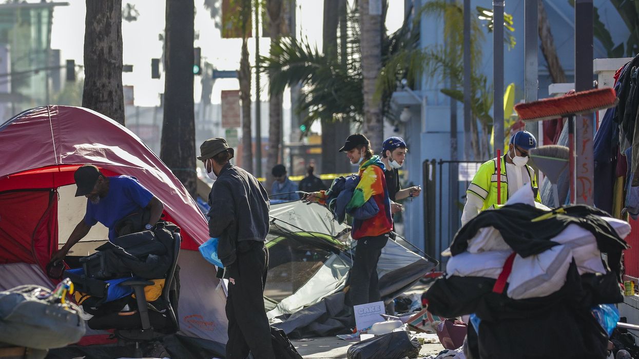 Hollywood business owners install planters to keep out homeless tents and promise to defy city order to remove them