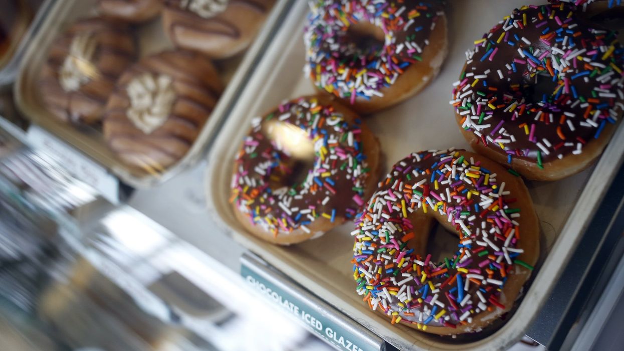 Video shows fed up donut shop owner fight back against tip jar thief after several robberies in California beach town