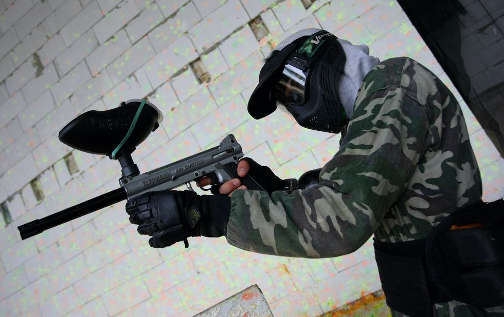 Security video shows California man shooting paintball gun at hooded men who were allegedly breaking into neighbor's home