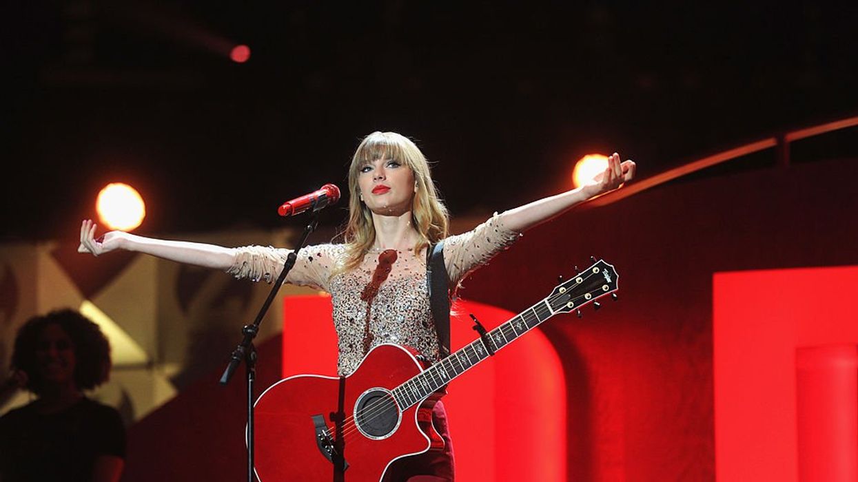Boomer takes hammer to guitar with Taylor Swift autograph after dropping $4,000 on it as fellow Texans roar with approval