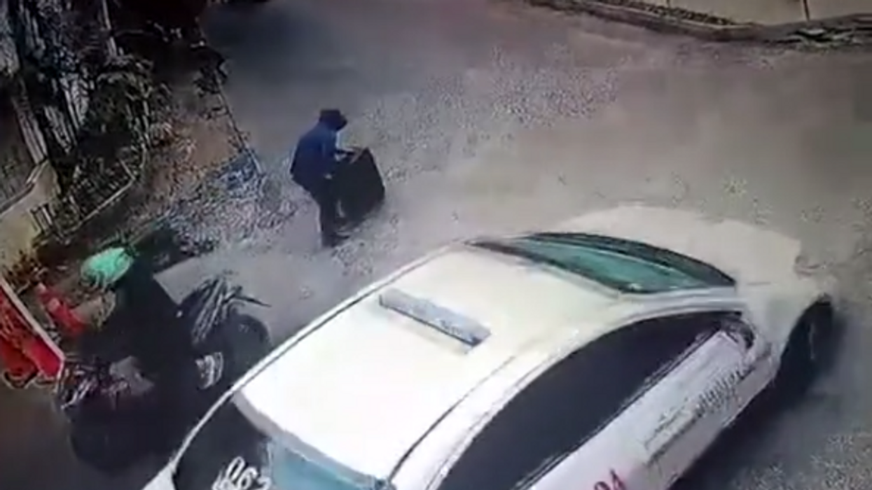 Chilling security camera video shows Philippines man abducting 8-year-old girl in a suitcase