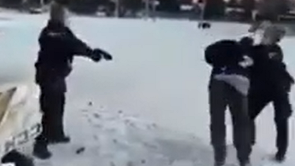 Unsettling video shows cops assaulting, pulling taser on young man for playing ice hockey outside