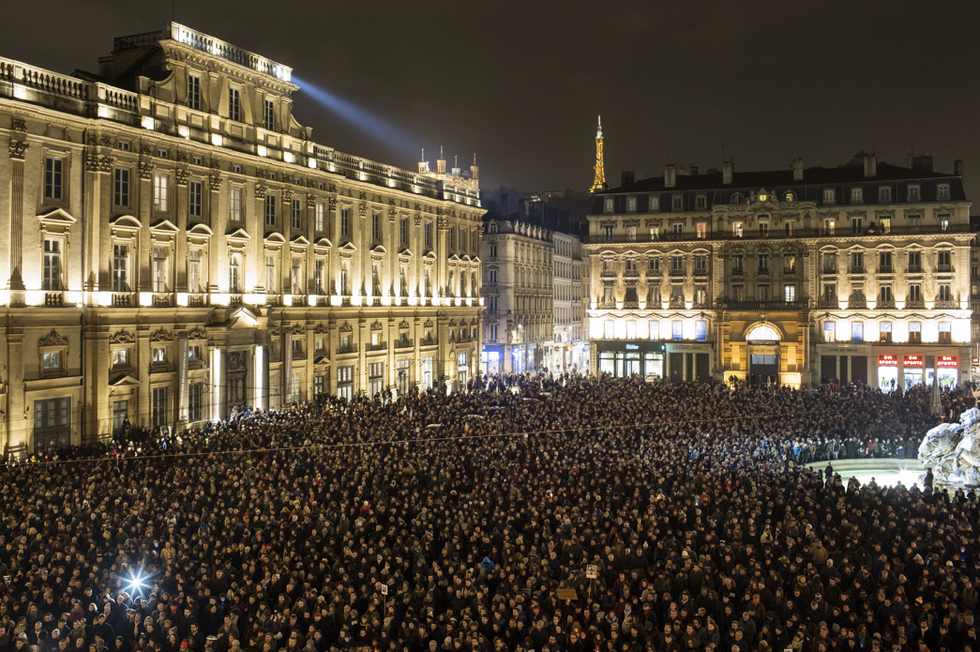 Photos: World Pays Tribute to 12 Killed at Charlie Hebdo Newspaper in France