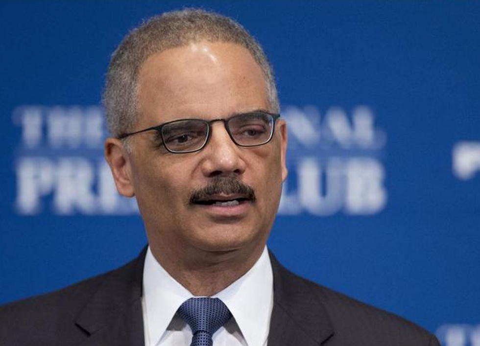 Eric Holder questions the logic of Congress for keeping him around so long