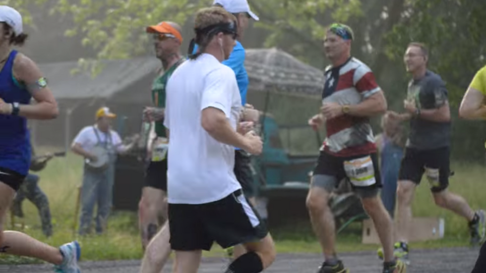 Half Marathon Runners Caught Off Guard by Viral 'Deliverance' Stunt That's Being Called 'Epic