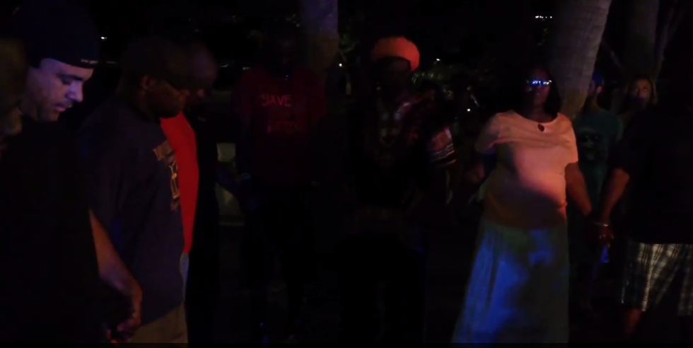 Camera Captures 'Powerful Moment of Prayer' Following Mass Shooting at Charleston Church