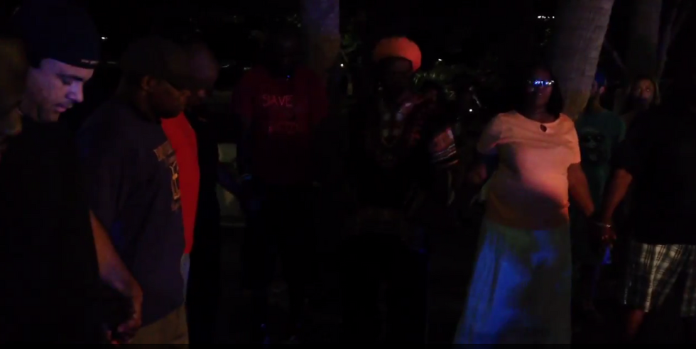 Camera Captures 'Powerful Moment of Prayer' Following Mass Shooting at Charleston Church