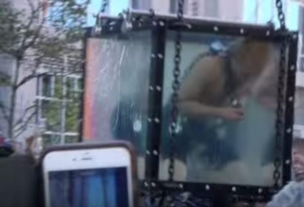 VIDEO: Escape Artist’s Attempt to Replicate Houdini’s ‘Water Torture Cell’ Trick Goes Terribly Wrong