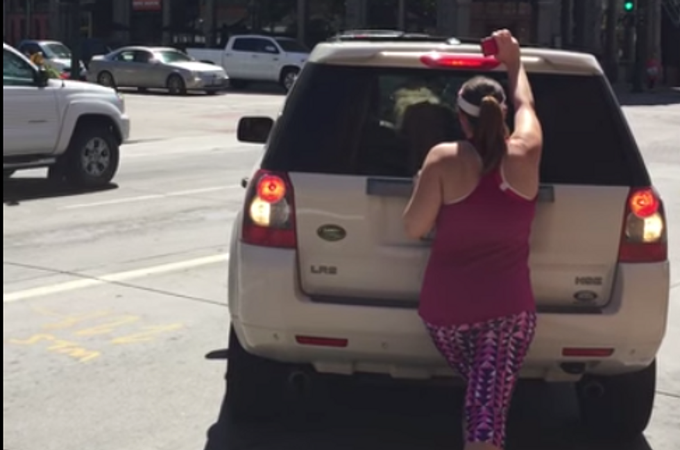 Man Captures Just Over a Minute of Insanity That Unfolds When 'Crazy Woman' Tries to Reserve Parking Spot by Foot