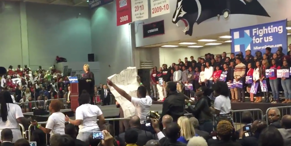 Just Watch Hillary Clinton's Reaction to Black Lives Matter Protesters Taking Control of Her Campaign Event: 'Hell You Talmbout!