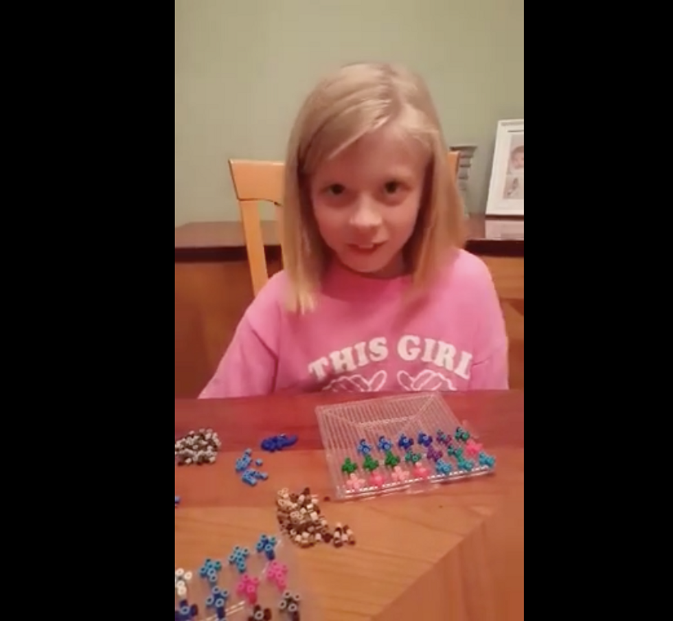 8-Year-Old Girl Makes Crosses For Police Officers to 'Spread God’s Word And to Protect Others\