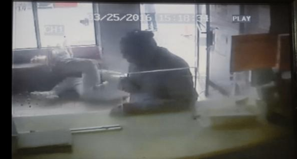Man Caught on Surveillance Camera Viciously Bashing a Cat Against a Wall