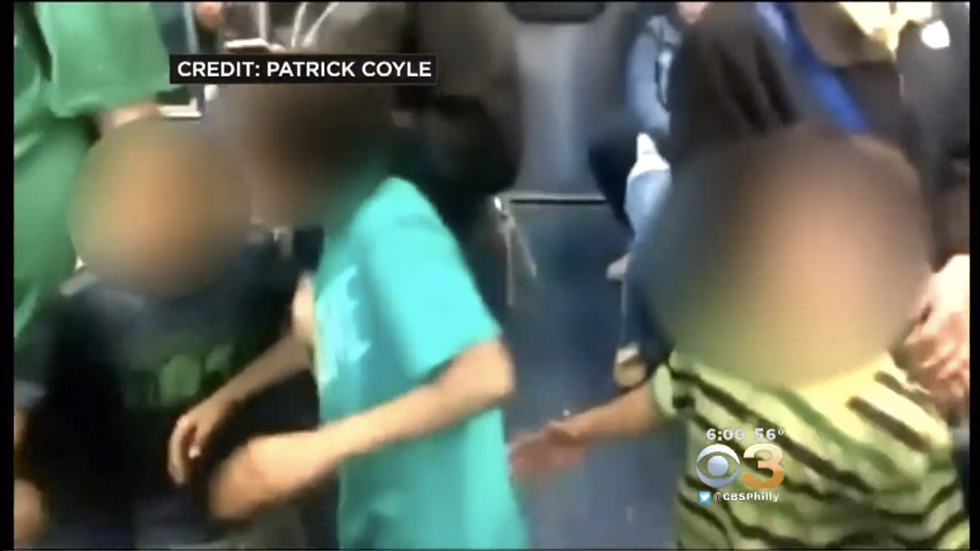 Young Boys Caught on Video Hitting, Cursing and Spitting on Train Passengers — but Behavior of Adult of the Group Is Equally Shocking