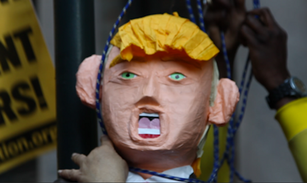 Protesters Lynch Trump Effigy Outside of NYC Hotel Ahead of His Speech
