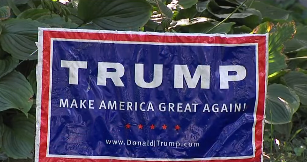 Woman Caught on Video Trying to Steal Man's Front Yard Trump Sign — but Karma Is Swift