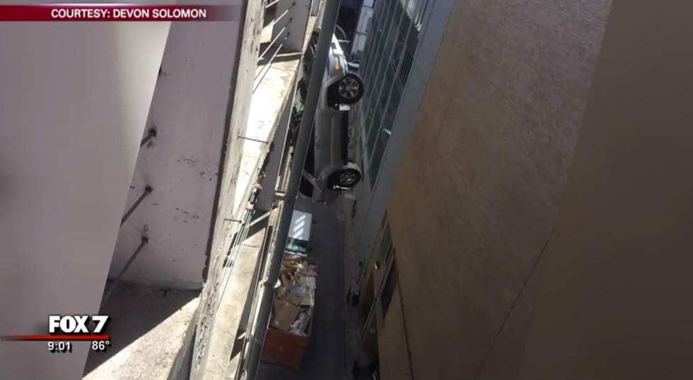 Wild Video: Driver Escapes From Vehicle Dangling From Austin Parking Garage