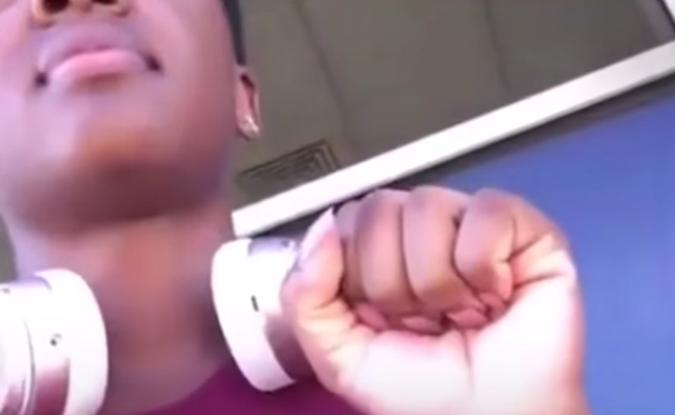 U.S. Navy Sailor Sits and Holds Up Fist During National Anthem, Gets Hit With Instant Karma