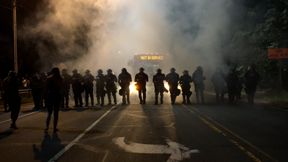 Following police shooting, protesters in Charlotte temporarily shut interstate, injure 16 officers (UPDATED)