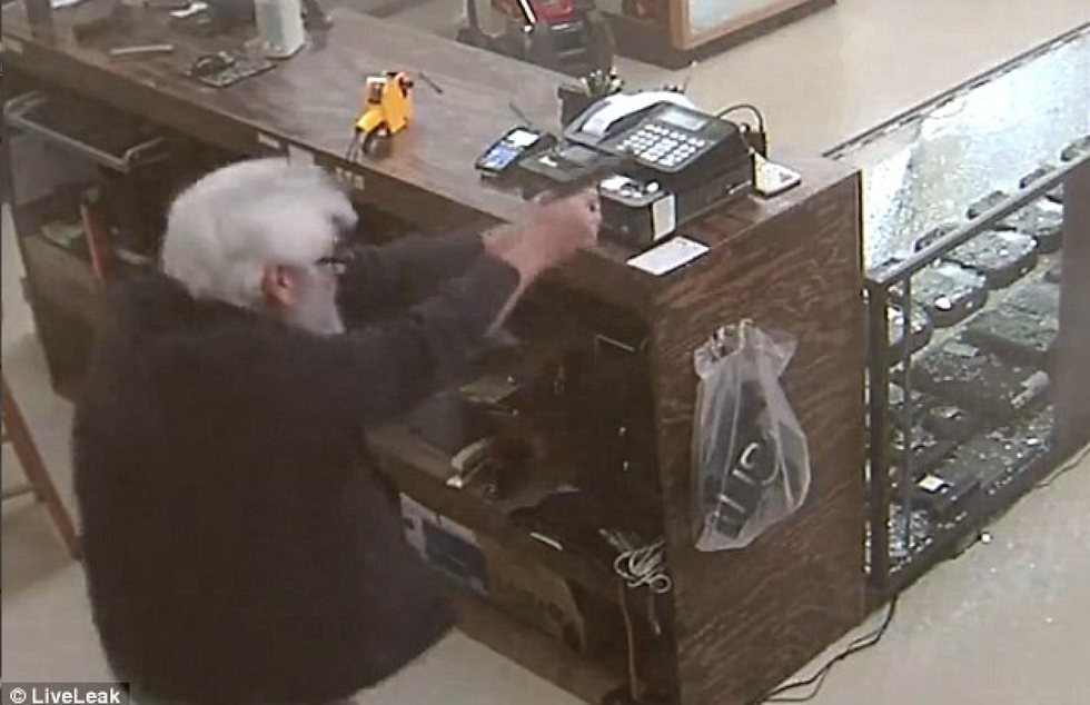 Georgia shop owner opens fire and kills armed robber on camera