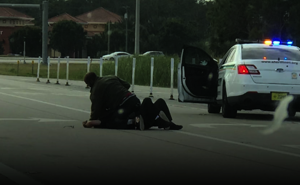 Watch: Cellphone footage captures armed citizen saving deputy by shooting his attacker