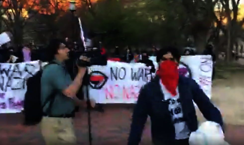 Watch: Reporter assaulted as Antifa clashes with Alt-Right during anti-war rally