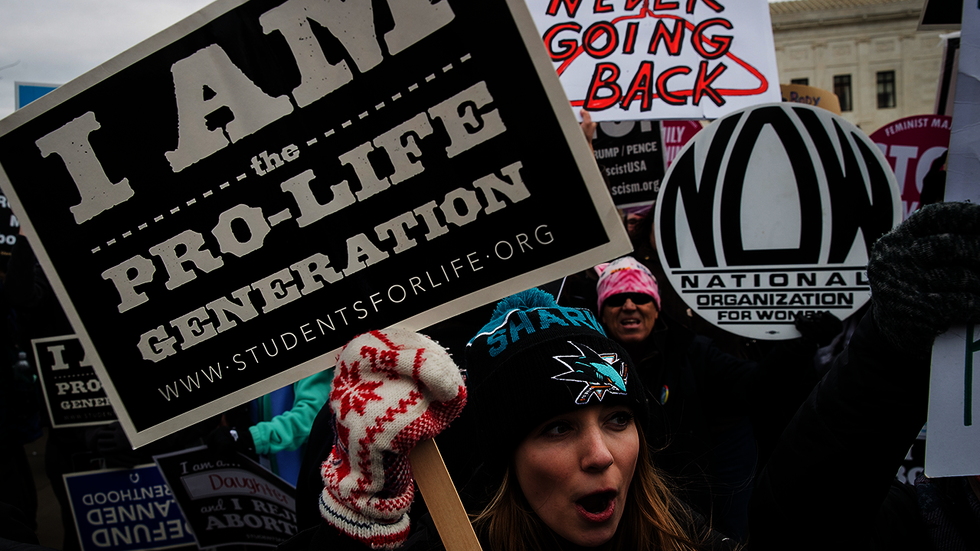 School administrator loses cool with pro-life protesters