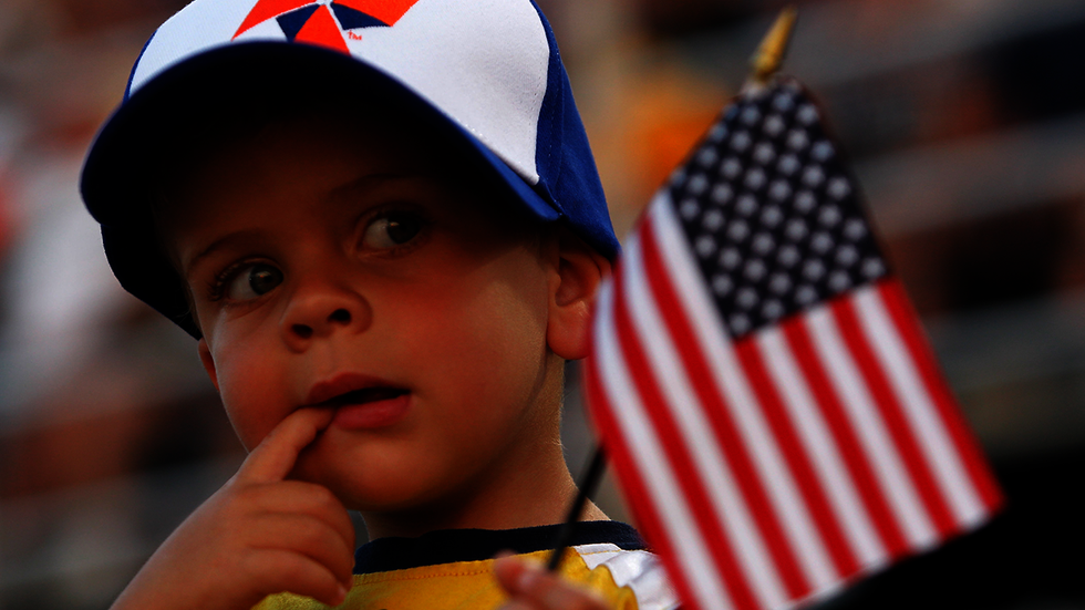 Sweet: 7-year-old caught on security camera pledging allegiance